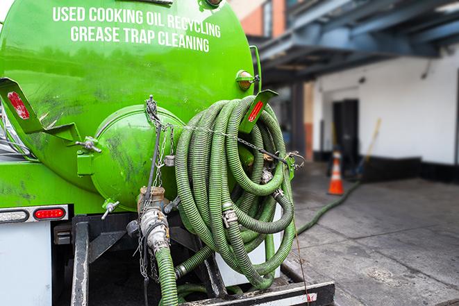 tank truck pumping out a grease trap in Boothbay